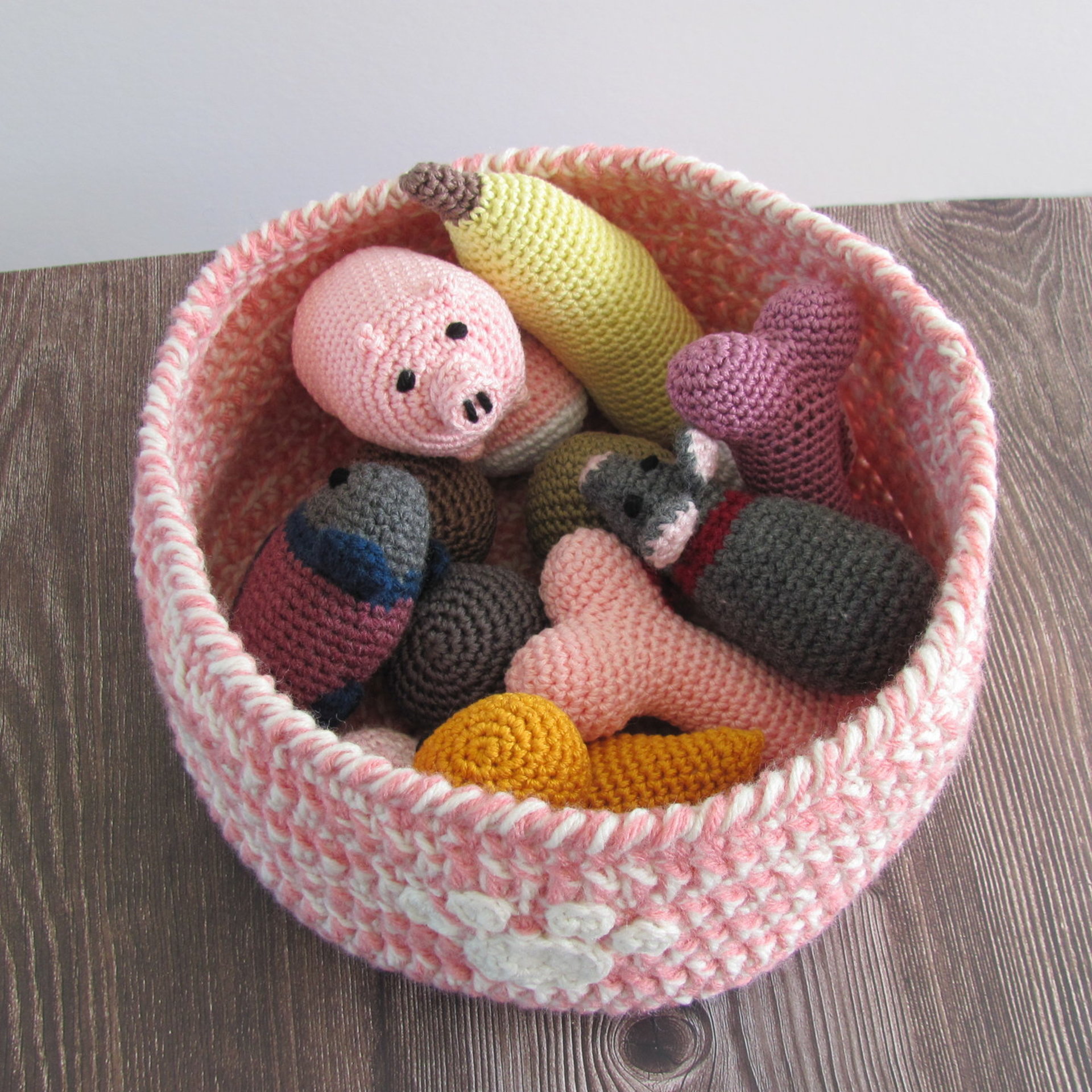 Pink and White Crocheted Paw Print Pet Toy Basket